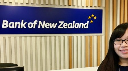 Photo of Margaret Bei smiling in front of a BNZ branch desk