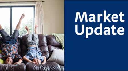 Market Update Header with image of two children doing head stands on couch